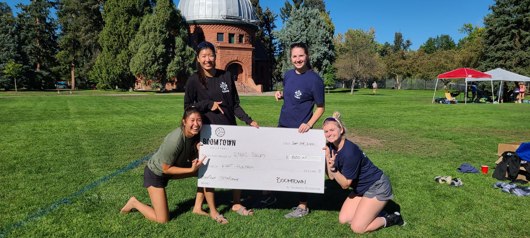 Boomtown Showdown winners RMAC Squad with the champion check