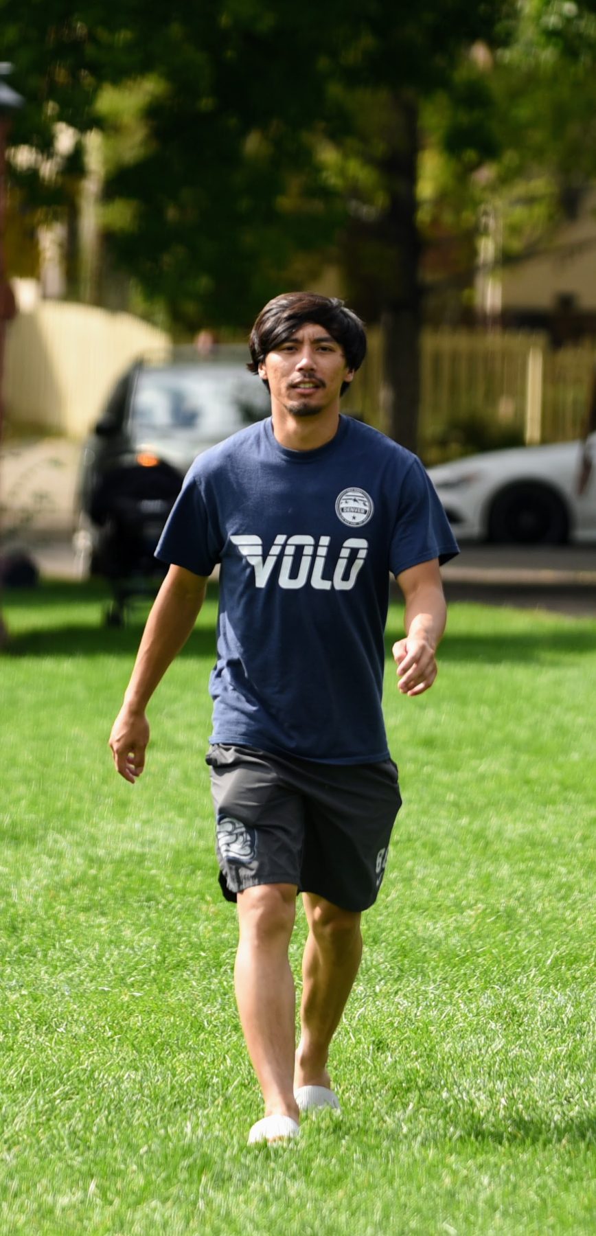 Boomtown Athletics co-ed player in a Volo Denver volleyball shirt