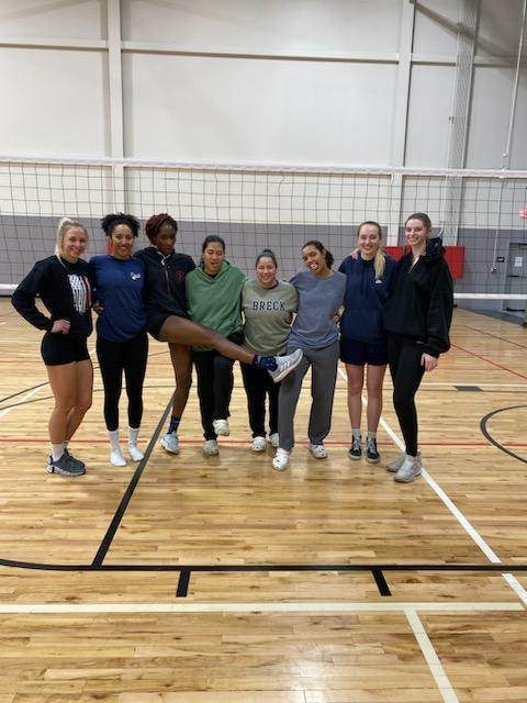 Boomtown Athletics women’s league team at the net inside Boomtown FieldhouseUSA, Aurora